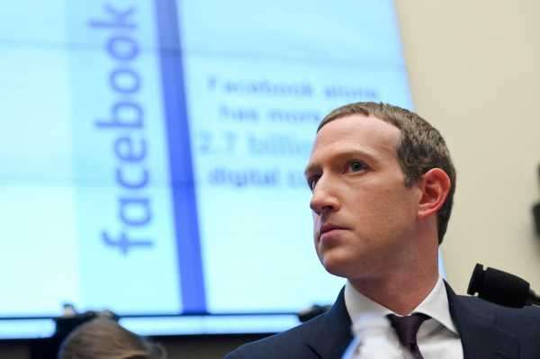 Facebook Chairman and CEO Zuckerberg testifies at a House Financial Services Committee hearing in Washington