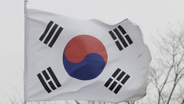South Korea demands Russian embassy remove banner with propaganda slogan from building
