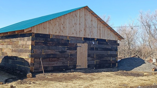 At what distance from neighbors can a shed…