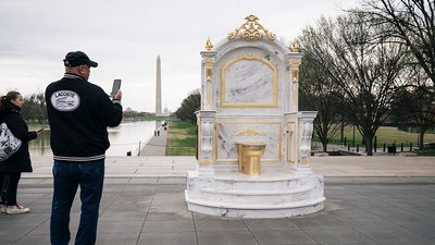 A statue of a golden toilet criticizing Trump has appeared in the…