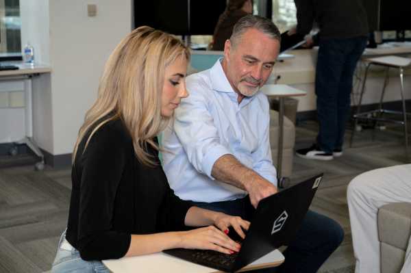 SiFive's CEO Patrick Little collaborates with Sahar Rahgozar at SiFive's headquarters in San Mateo