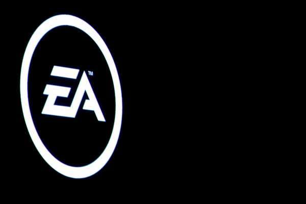 The Electronic Arts Inc., logo is displayed on a screen during a PlayStation 4 Pro launch event in New York