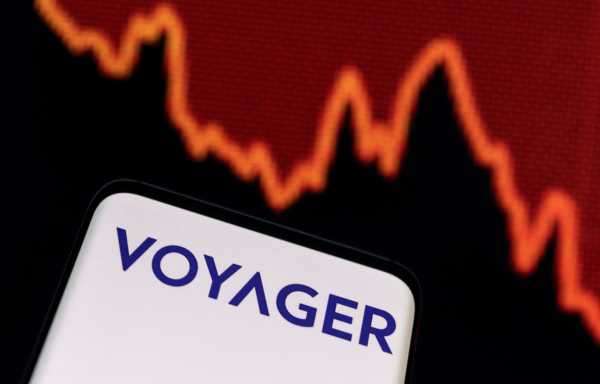 Illustration shows Voyager Digital logo and decreasing stock graph